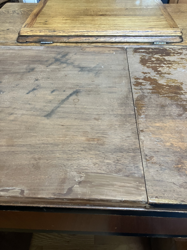 Cabinet top with hinged leaf